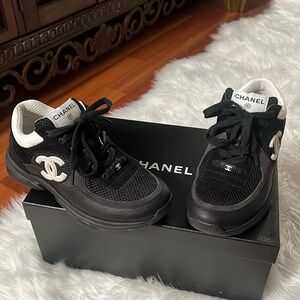 Chanel Sneakers: Black CC logo Lambskin Sneakers